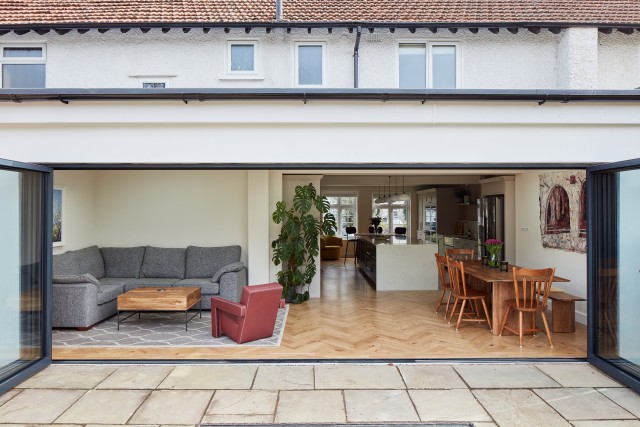bifold doors herringbone timber floor