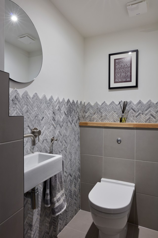 guest wc herringbone tiling design